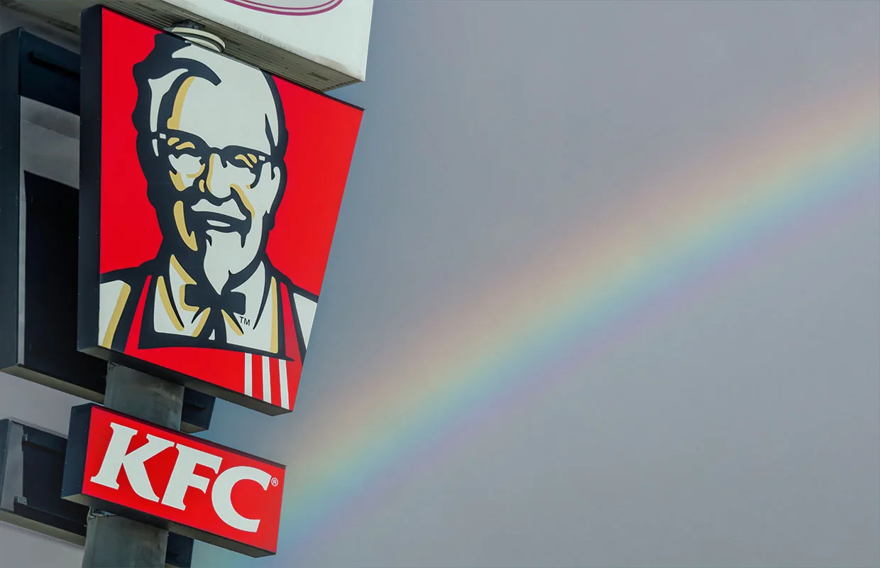 Kentucky Fried Chicken pylon sign over blue sky