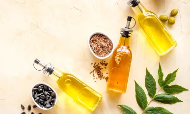 Different kind of cooking oil - sunflower olive and sesame oil with seeds